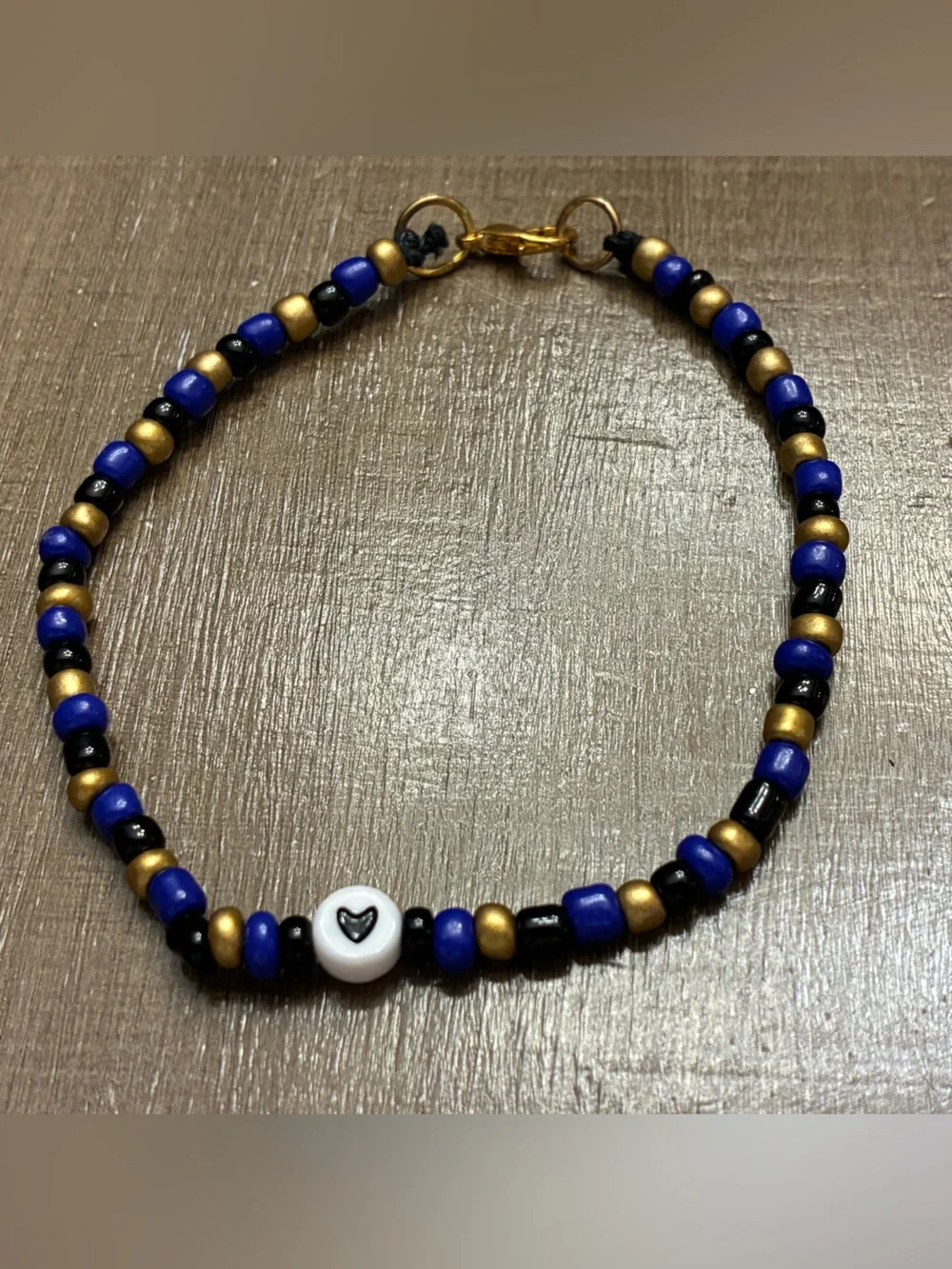 Handmade Blue, Black & Gold Beaded Bracelet with Heart Accent